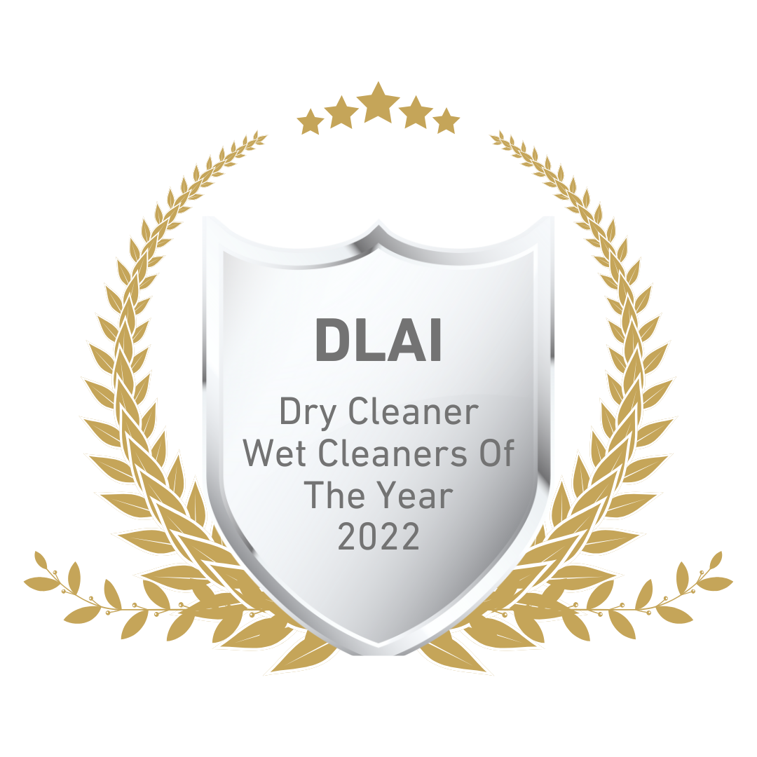 Award badge with "DLAI Dry Cleaner Wet Cleaners of the Year 2022" text and golden laurel wreath.