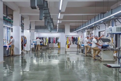 Modern garment care facility using advanced technology and machines in Mumbai.